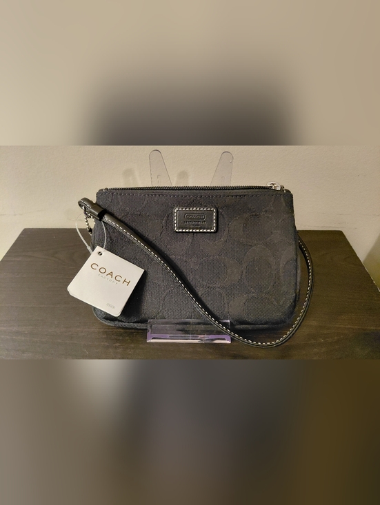 Coach Handbags - NWT Coach Black Signature Canvas Wristlet with Leather Strap